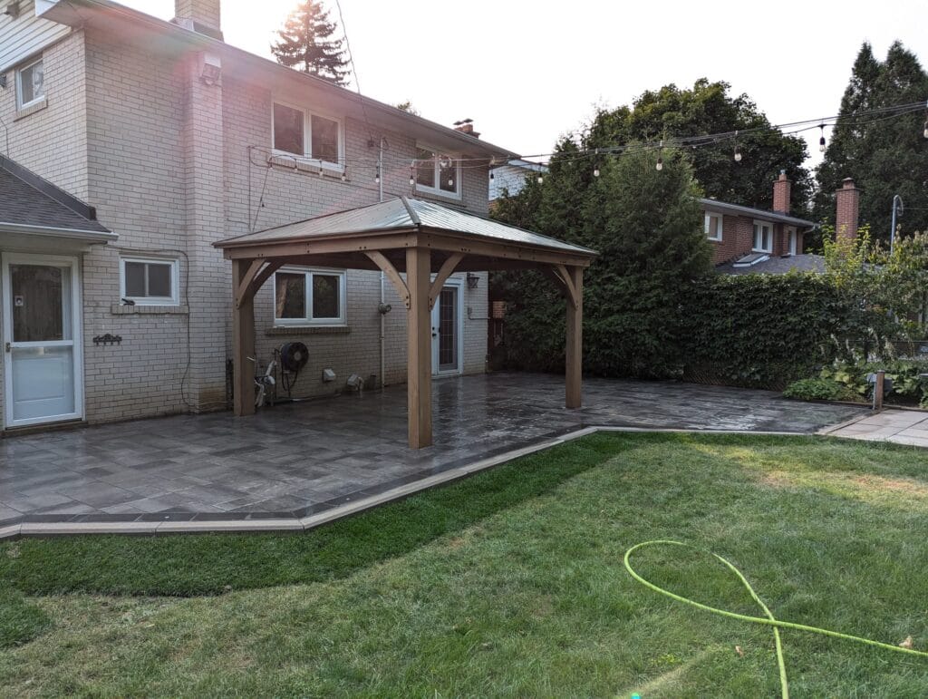 fresh sod installed around the outside of the patio