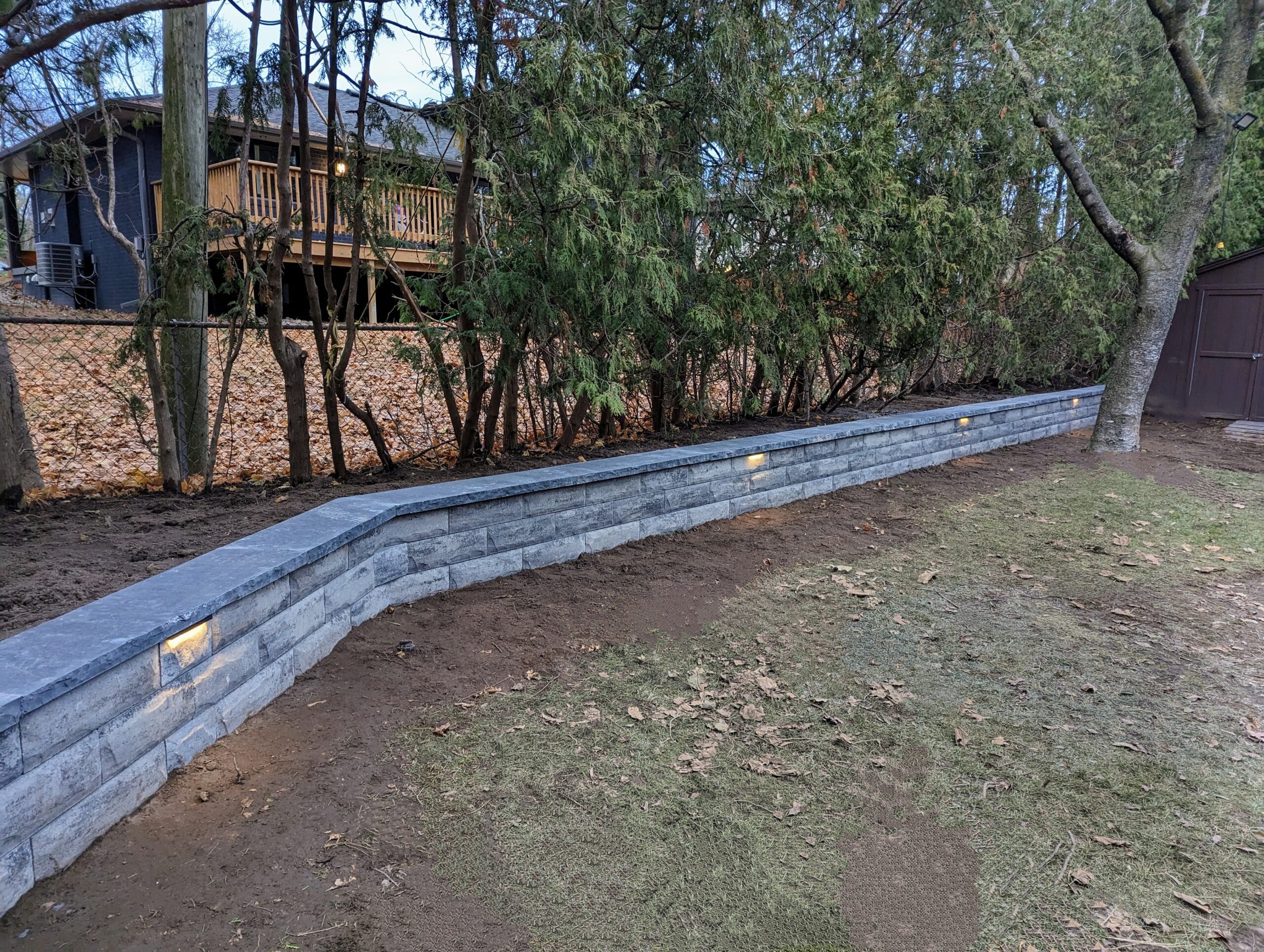high end retaining wall with led lighting in etobicoke