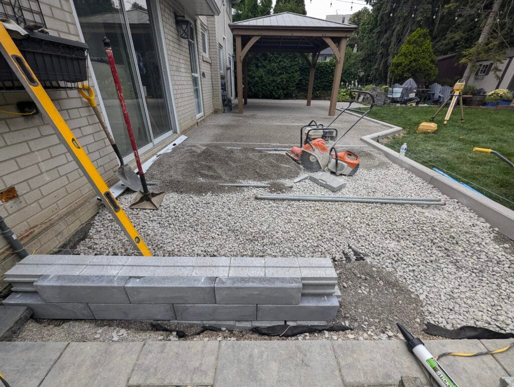 second view of constructing the retaining wall before the interlock patio is started