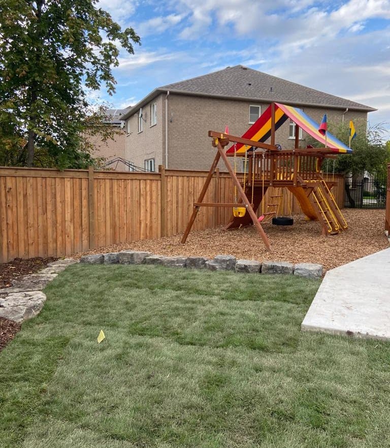 playground new playground with mulch, new sod and armour stone